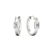 bezel-emerald-diamond-huggie-hoop-earrings-in-white-gold-platinum-fdear11743emangle1-nl-wg.jpg?v=1778042331